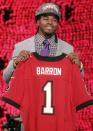 Alabama's Mark Barron poses for photographs after being selected as the seventh pick overall by the Tampa Bay Buccaneers in the first round of the NFL football draft at Radio City Music Hall, Thursday, April 26, 2012, in New York. (AP Photo/Jason DeCrow)
