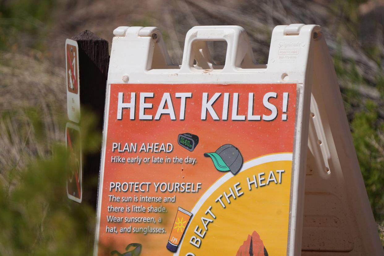 A "Heat Kills" sign at Capitol Reef National Park outside of Torrey, Utah, US, on Tuesday, June 14, 2022. Record high temperatures continue to sear the US Southwest through the Mississippi Valley, driving weekend energy demand as people turn to air conditioners to cool down.