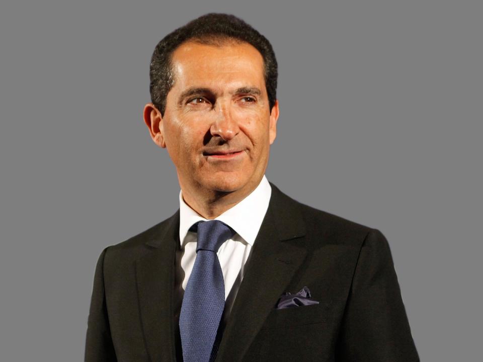 Patrick Drahi headshot, as Altice group founder and chairman, graphic element on gray