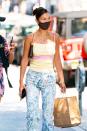 <p>The hottest transitional accessory from summer to fall in 2020: a face mask. Bella Hadid safely shopped around Williamsburg, NYC in printed denim and a strappy top.<br></p>