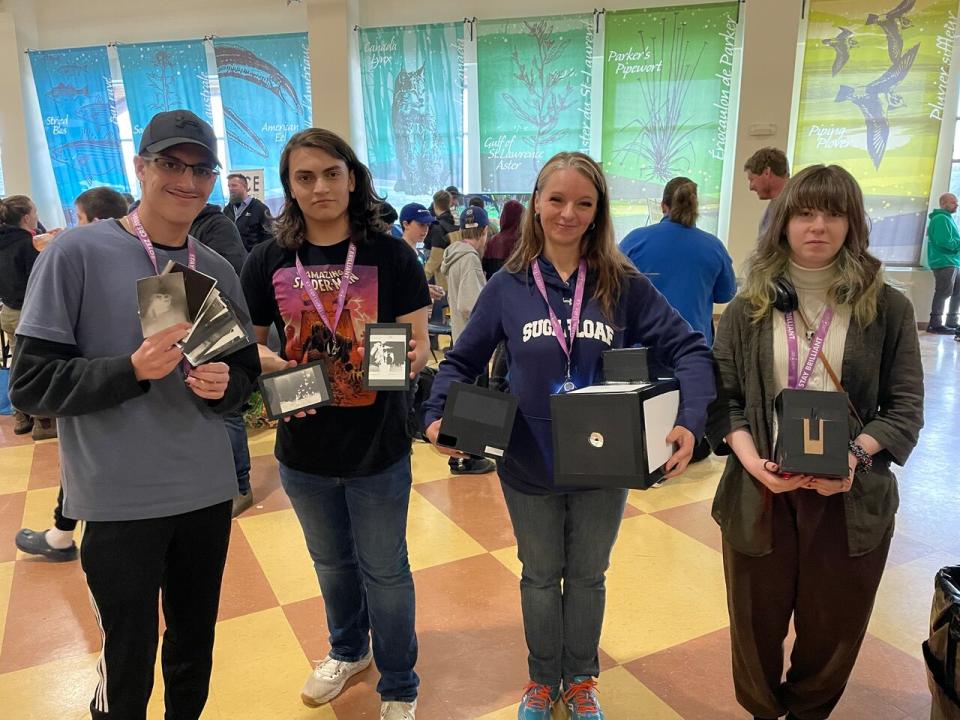 Students from Sugarloaf Senior High School in Campbellton made pinhole cameras in preparation for the eclipse. From right to left: Blaze Parker, Caleb Parent, teacher Andrea Powers and Calley Pollock.