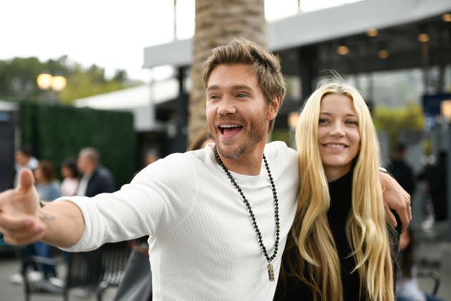 <p>Noel Vasquez/Getty</p> Chad Michael Murray and Sarah Roemer in 2019