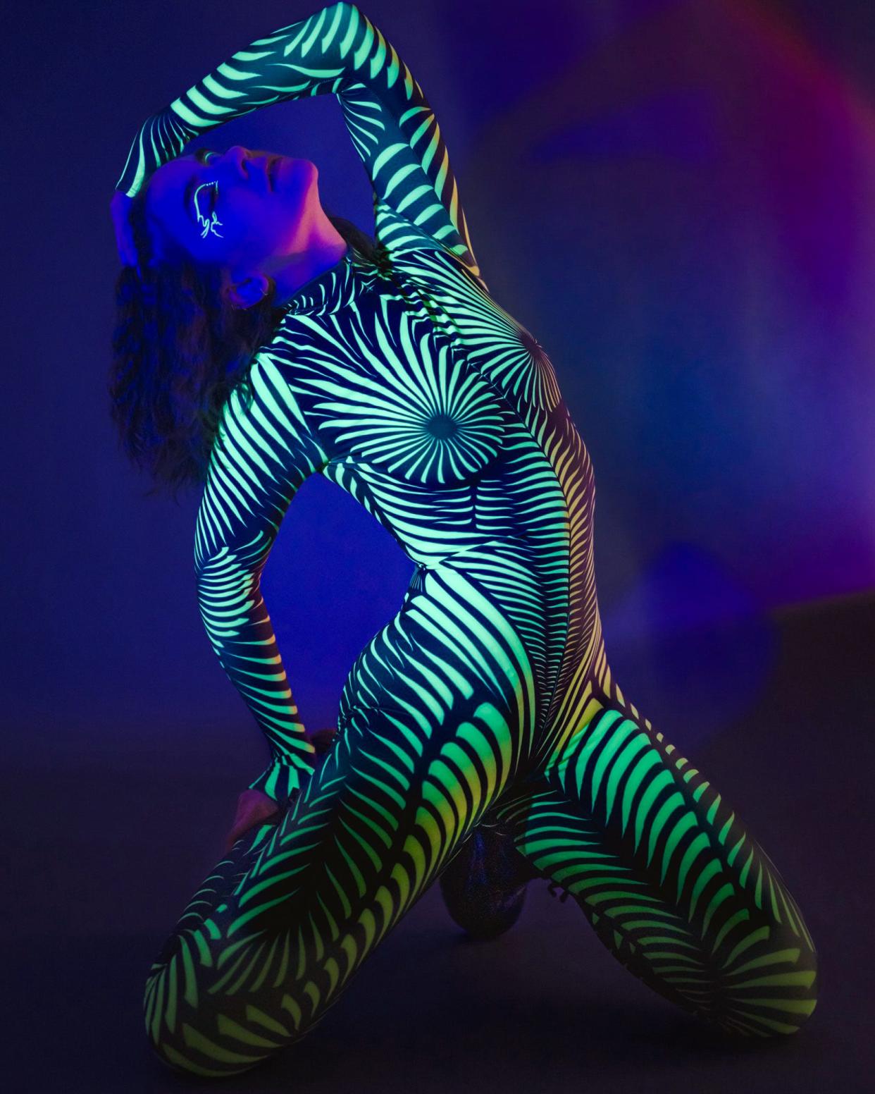 The "Illuminate" art show will be Friday night at The Hub Art Factory in downtown Canton, featuring models in body paint with glow-in-the-dark effects.
