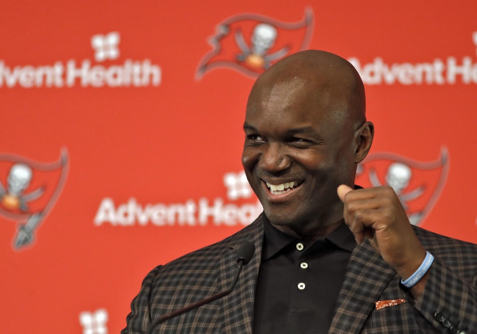 New Tampa Bay Buccaneers defensive coordinator Todd Bowles smiles as he answers a question during a news conference Friday, Jan. 11, 2019, in Tampa, Fla. Bowles was formerly head coach of the New York Jets. (AP Photo/Chris O'Meara)