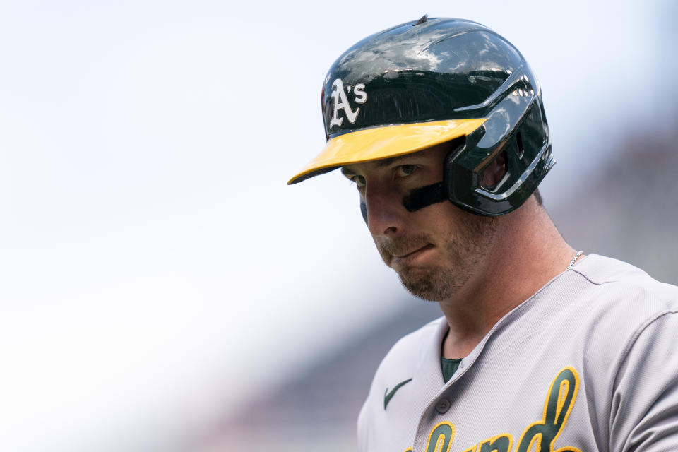 Oakland Athletics' Brent Rooker reacts after striking out swinging during the third inning of a baseball game against the Washington Nationals, Sunday, Aug. 13, 2023, in Washington. (AP Photo/Stephanie Scarbrough)