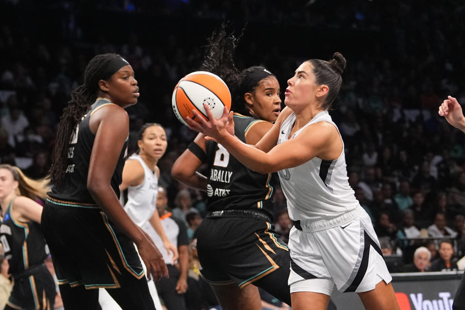 September 29, 2024; Brooklyn, New York, USA; Las Vegas Aces guard Kelsey Plum (10) scores a layup against the New York Liberty in game one of the 2024 WNBA Semifinals at Barclays Center. Mandatory attribution: Gregory Fisher-Imagn Images