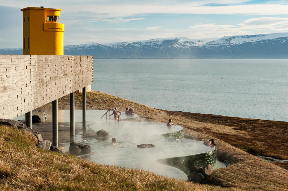 The city of Husavik's manmade hot spring overlooks the sea, making it a perfect place to spot whales.