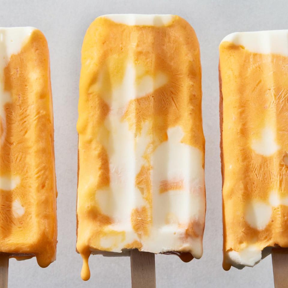 frozen creamsicle bars with orange and cream swirls