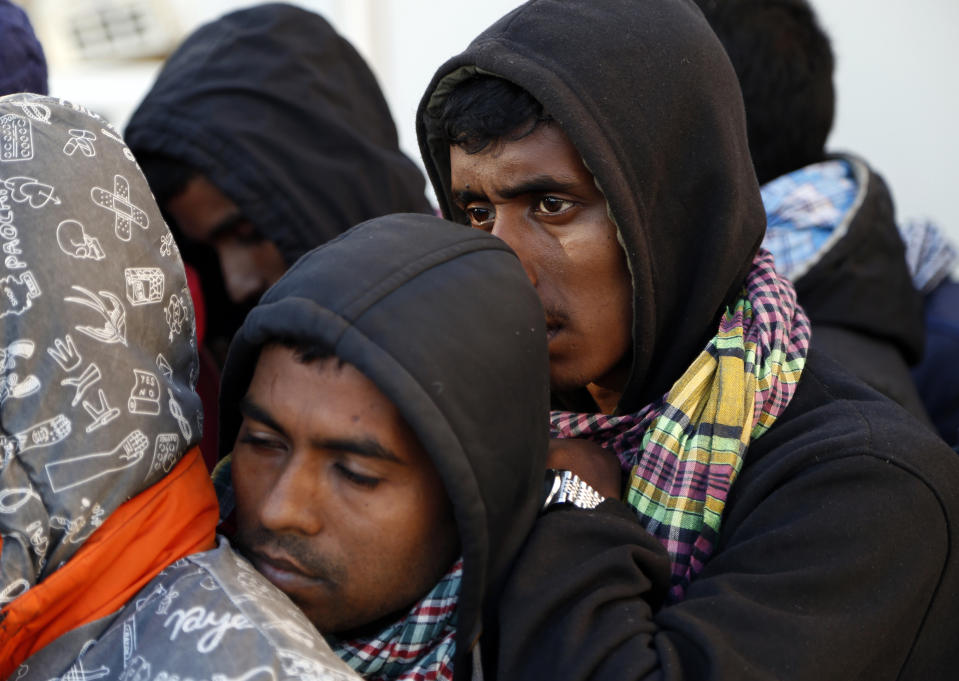 Detained migrants stand in line after being returned to Libya following an attempt to cross the Mediterranean Sea, in Misrata, Libya, Sunday, April 24, 2022. The Libyan Coast Guard said that it brought 549 migrants of several nationalities back to shore overnight. The forces who call themselves the country’s coast guard frequently forcibly return migrants to Libya, where they are then indefinitely imprisoned in facilities rife with abuses. (AP Photo/Yousef Murad)