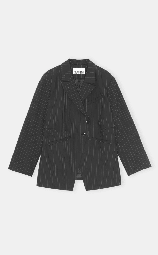 <p>Ganni Asymmetrical Blazer, $346 (from $495), <a href="https://www.ganni.com/us/asymmetrical-blazer-F6796.html?dwvar_F6796_color=Phantom" rel="nofollow noopener" target="_blank" data-ylk="slk:available here;elm:context_link;itc:0;sec:content-canvas" class="link ">available here</a> (sizes 0-22)</p>
