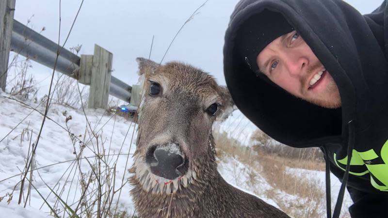 Thomas Christopher took this photo with a deer he helped saved near Peterborough, Ont., on Nov. 18, 2018. Photo from <a href="https://www.facebook.com/stephanie.garrison.35?hc_ref=ARSX9Bh2zBfaaIhGU8rn-gI93_t0hIjeManygRHanx0T3Q8VYeUstX-3NNZaQnkBuQY" rel="nofollow noopener" target="_blank" data-ylk="slk:Stephanie Christopher/Facebook;elm:context_link;itc:0;sec:content-canvas" class="link ">Stephanie Christopher/Facebook</a>.