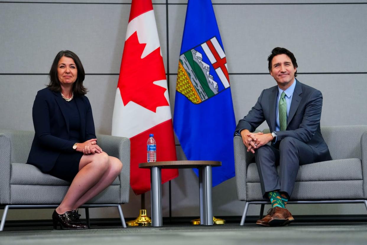 Prime Minister Justin Trudeau meets with Alberta Premier Danielle Smith in Ottawa  last year. A new CBC News poll finds that standing up to the federal government matters a lot to Albertans who approve of the governing UCP. (Sean Kilpatrick/The Canadian Press - image credit)