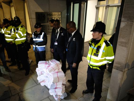 Protesters dumped documents representing rape victims’ phone data outside the CPS’s offices in November (Sister&#039;s Uncut)