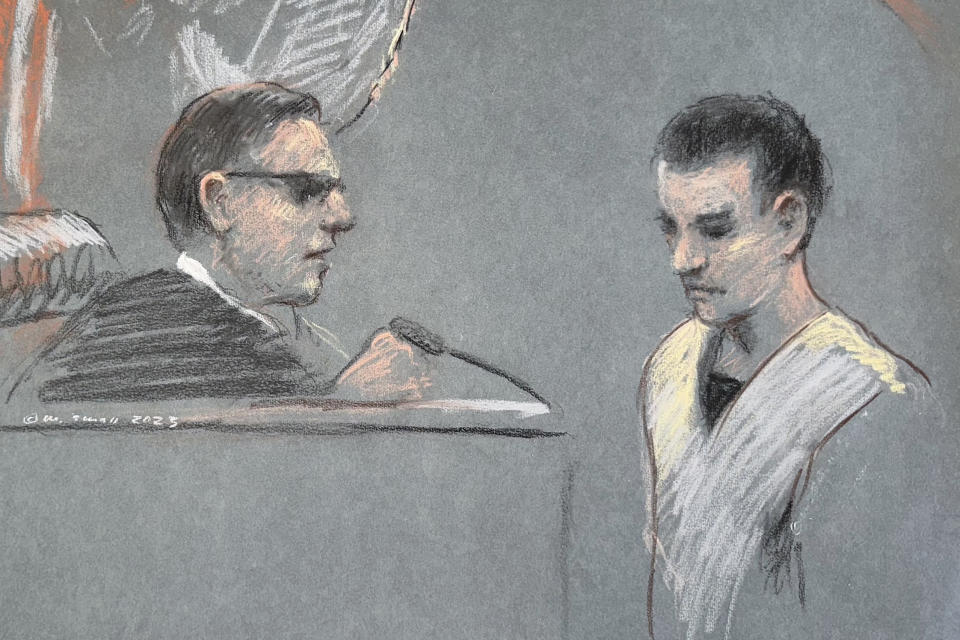 FILE - Massachusetts Air National Guardsman Jack Teixeira, right, appears in U.S. District Court in Boston, Friday, April 14, 2023. A judge is expected to hear arguments Thursday, April 27, over whether Teixeira, accused of leaking highly classified military documents about the Ukraine war and other issues, should remain in jail while he awaits trial. (Margaret Small via AP, File)