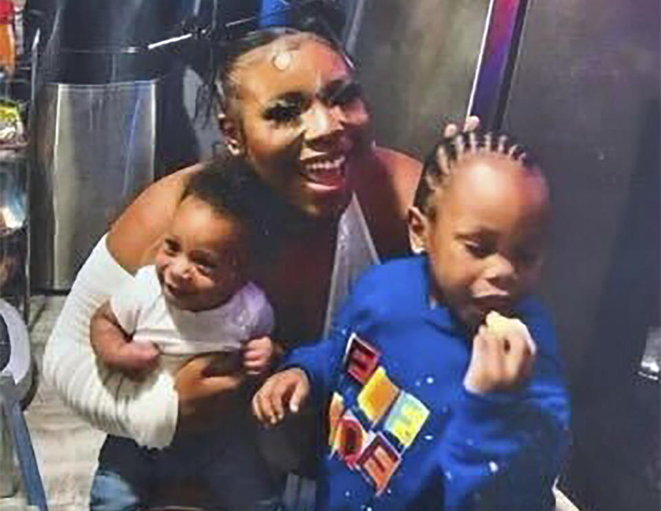 In this photo released by the Young Family via their family attorney, Ta'Kiya Young is pictured with her sons, Ja'Kobie, right, and Ja'Kenlie, left, in an undated photo. Young was shot and killed on Aug. 24, 2023, by Blendon Township police outside an Ohio supermarket. The 21-year-old was pregnant and due to give birth in November, according to her family. (Courtesy of Young Family/Walton + Brown LLP via AP)