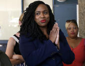 FILE - This July 21, 2019 file photo shows U.S. Rep. Ayanna Pressley, D-Mass., center, attending the Roxbury Unity Parade in the Roxbury neighborhood of Boston. Pressley, whose hair twists were an inspiration to young girls and part of her personal identity and political brand, revealed Thursday, Jan. 16, 2020, that she has gone bald due to alopecia. The freshman Massachusetts' Democrat made a touching video for The Root, the African American-focused online magazine, in which she revealed her bald head. (AP Photo/Steven Senne, File)