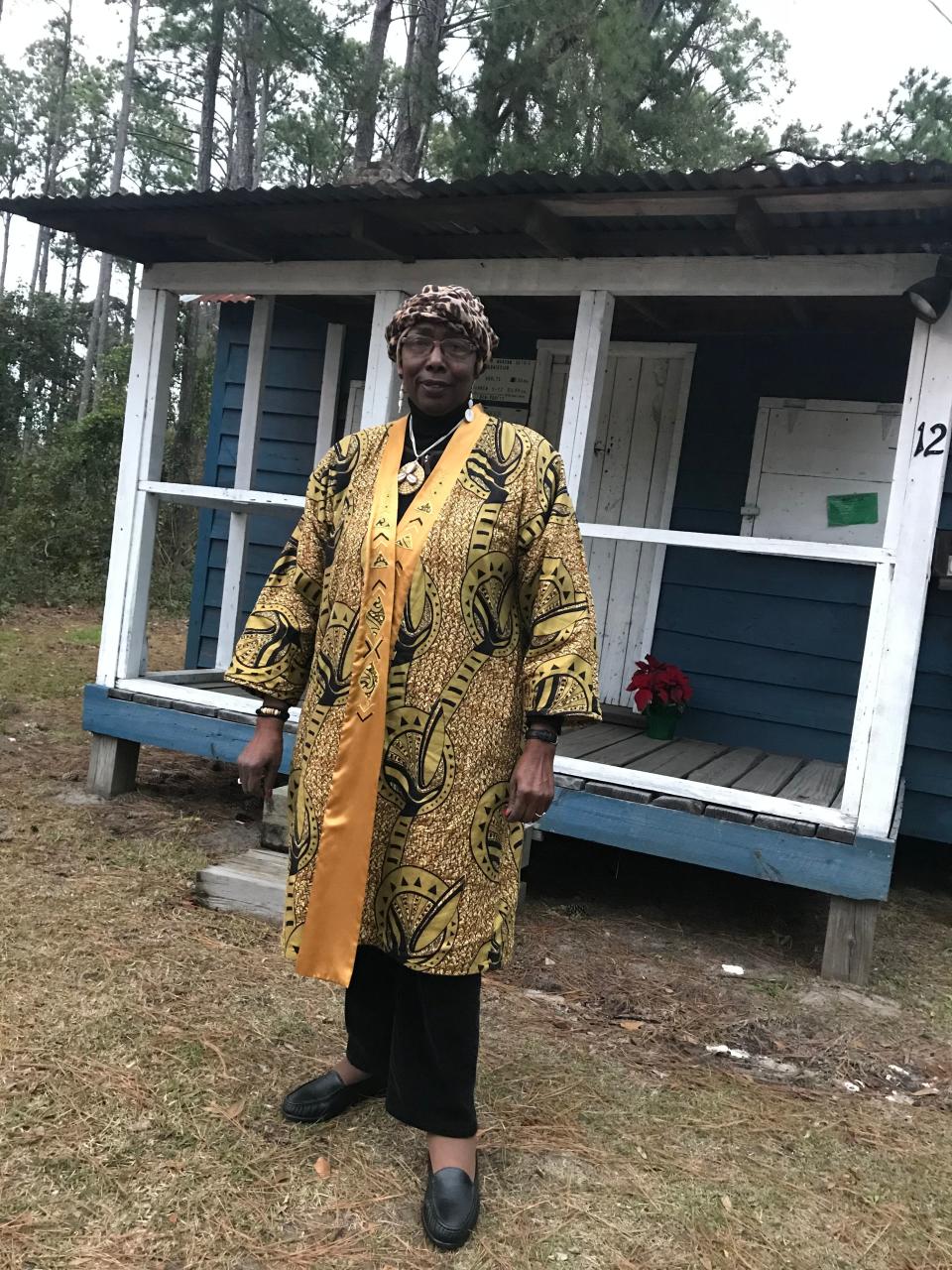 Louise Cohen stands outside her father's restored house, now called the Gullah Museum of Hilton Head Island, on January 15, 2019.