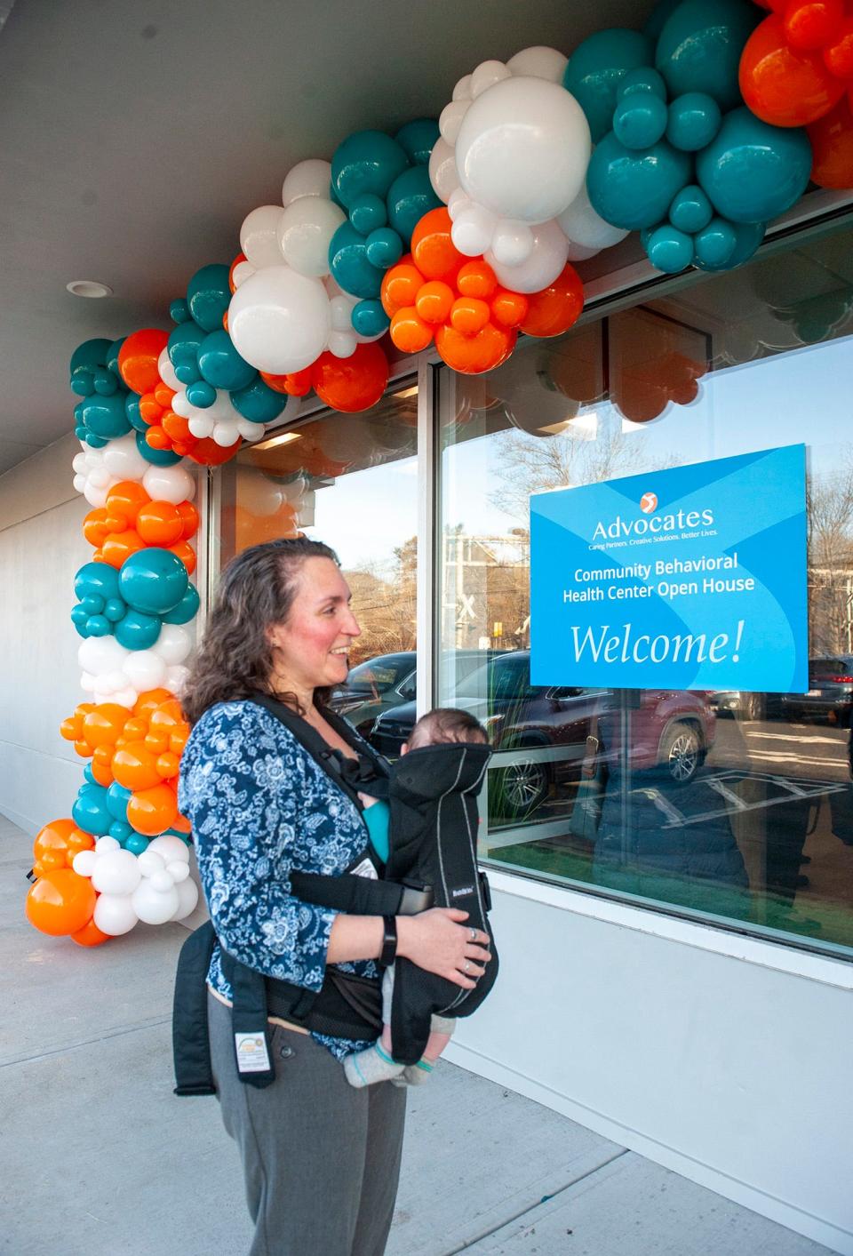 Advocates, Inc. Outpatient Clinical Director Allison O'Connell  with son Liam outside at the new Advocates Community Behavioral Health Center open house, Feb. 15, 2023.