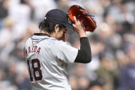 Detroit Tigers starting pitcher Kenta Maeda reacts after giving up a two-run home run to Chicago White Sox's Luis Robert Jr., during the third inning of a baseball game Saturday, March 30, 2024, in Chicago. (AP Photo/Charles Rex Arbogast)