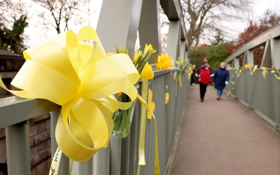 Yellow ribbons placed on the bridge over the river Wyre, in Lancashire - Julian Hamilton