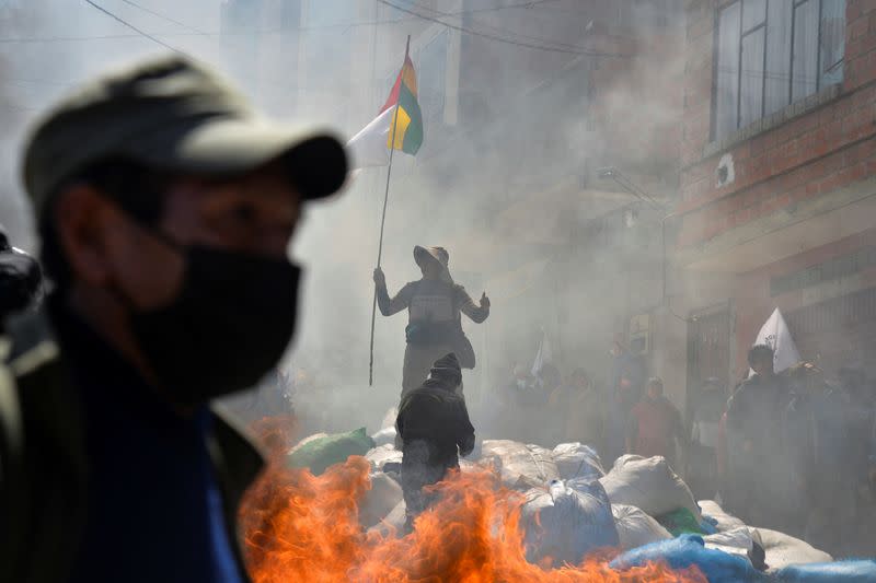 Coca growers clash during a protest against a parallel coca market, in La Paz