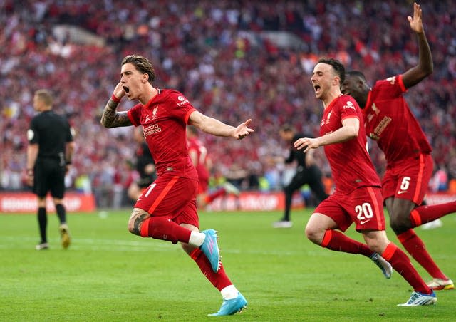 Kostas Tsimikas celebrates scoring his penalty to win the 2022 FA Cup