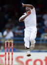 West Indies bowler Kemar Roach delivers during the first day of the second-of-three Test matches between Australia and West Indies April 15, 2012 at Queen's Park Oval in Port of Spain, Trinidad. AFP PHOTO/Stan HONDA