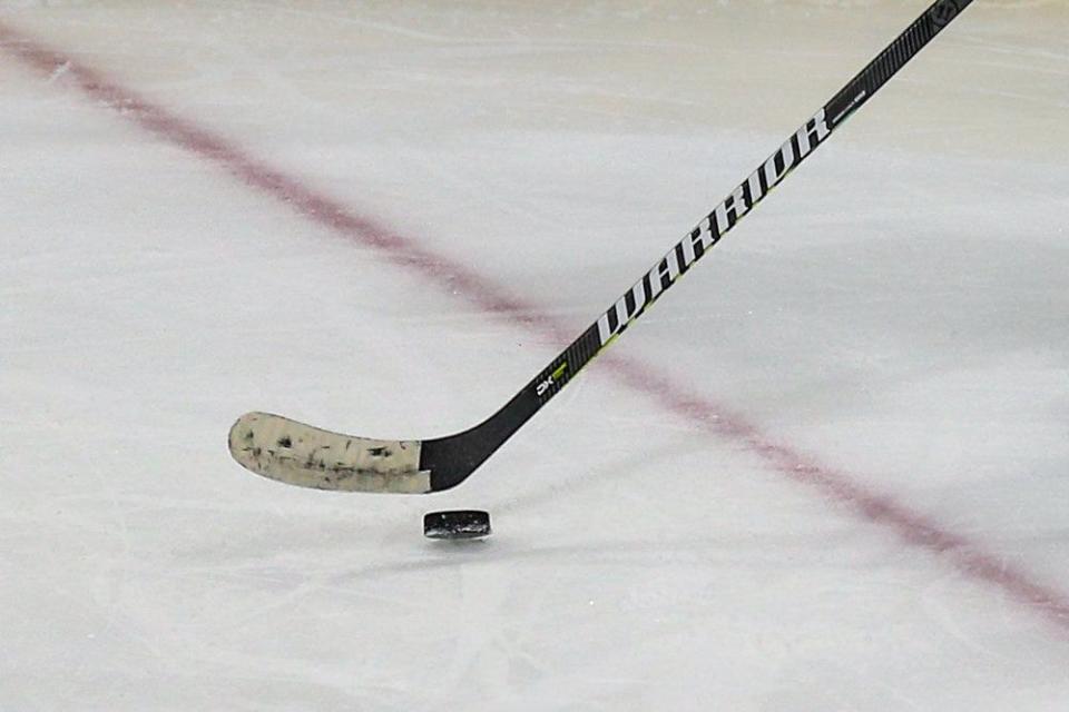 The puck in play during the second period of an ECHL hockey game between the Jacksonville Icemen and the South Carolina Stingrays at Veterans Memorial Arena in Jacksonville, Fla., Sunday, April 18, 2021.  [Gary Lloyd McCullough/For the Jacksonville Icemen]