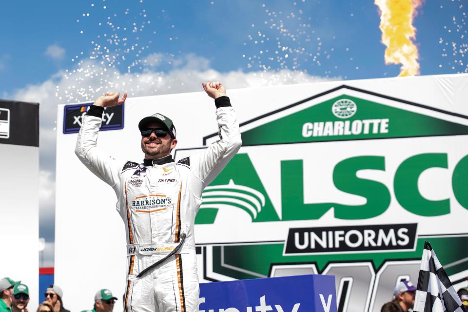 Josh Berry celebrates in Victory Lane after winning a NASCAR Xfinity auto race at Charlotte Motor Speedway on Saturday, May 28, 2022, in Concord, N.C. (AP Photo/Matt Kelley)