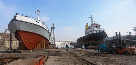 Workers repair an Iraqi ship at a shipyard built by the British Army on Basra's docks in 1918, in Basra, Iraq December 23, 2018. REUTERS/Essam al-Sudani