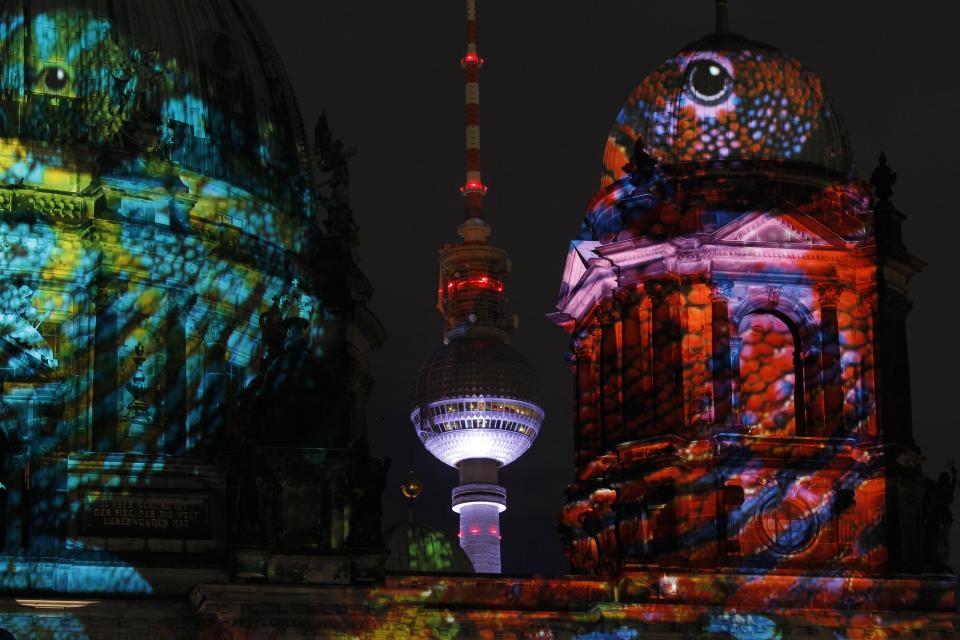 The Berliner Dom cathedral and the television tower are pictured during a rehearsal for the upcoming festival of lights in Berlin