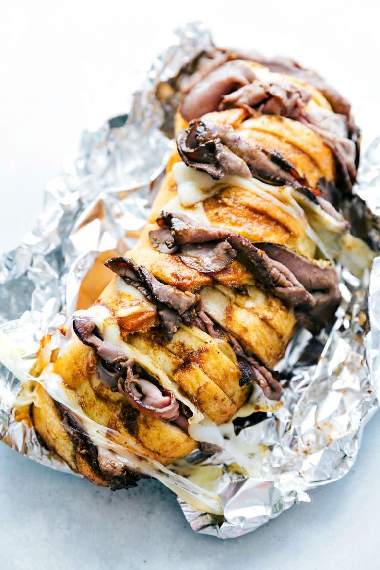 <p>Who says camping food has to suck?</p><p>Get the recipe from<span> <a rel="nofollow noopener" href="https://www.chelseasmessyapron.com/foil-pack-french-dip-sandwiches/" target="_blank" data-ylk="slk:Chelsea's Messy Apron;elm:context_link;itc:0;sec:content-canvas" class="link ">Chelsea's Messy Apron</a>.</span></p>