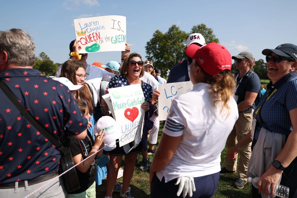 Fans react to Lauren Coughlin of Team United States after her winning putt on the 15th green during the Saturday Foursomes matches against Team Europe during the second round of the Solheim Cup 2024 at Robert Trent Jones Golf Club on September 14, 2024 in Gainesville, Virginia. (Photo by Scott Taetsch/Getty Images)