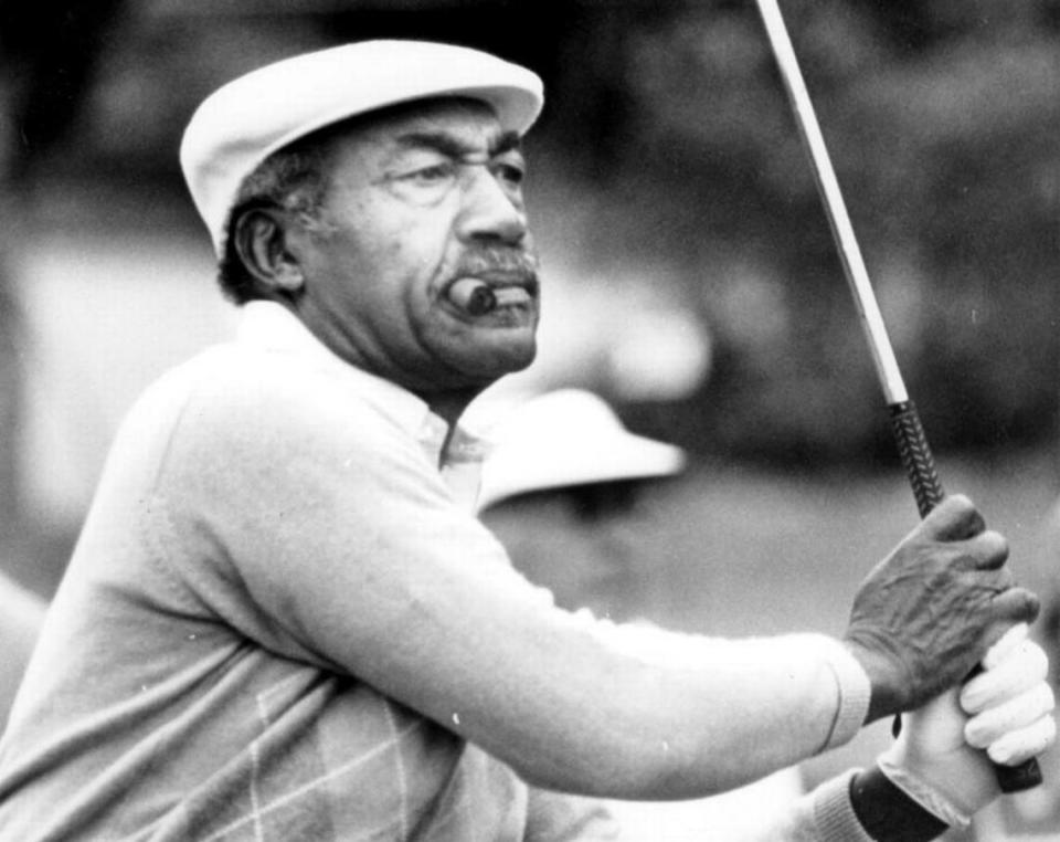 Charles Sifford plays during the Johnny Mathis Senior golf tournament at MountainGate in March 1986. Sifford died Tuesday, Feb. 3, 2015. He was 92.