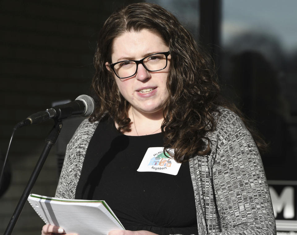 Librarian Kathryn Brady speaks at a press conference before the McMinn County School Board meeting, Thursday, Feb. 10, 2022, in Athens, Tenn. The school board heard from concerned citizens about the removal of the Pulitzer Prize-winning graphic novel about the Holocaust "Maus," from the district's curriculum at the meeting. (Robin Rudd/Chattanooga Times Free Press via AP)