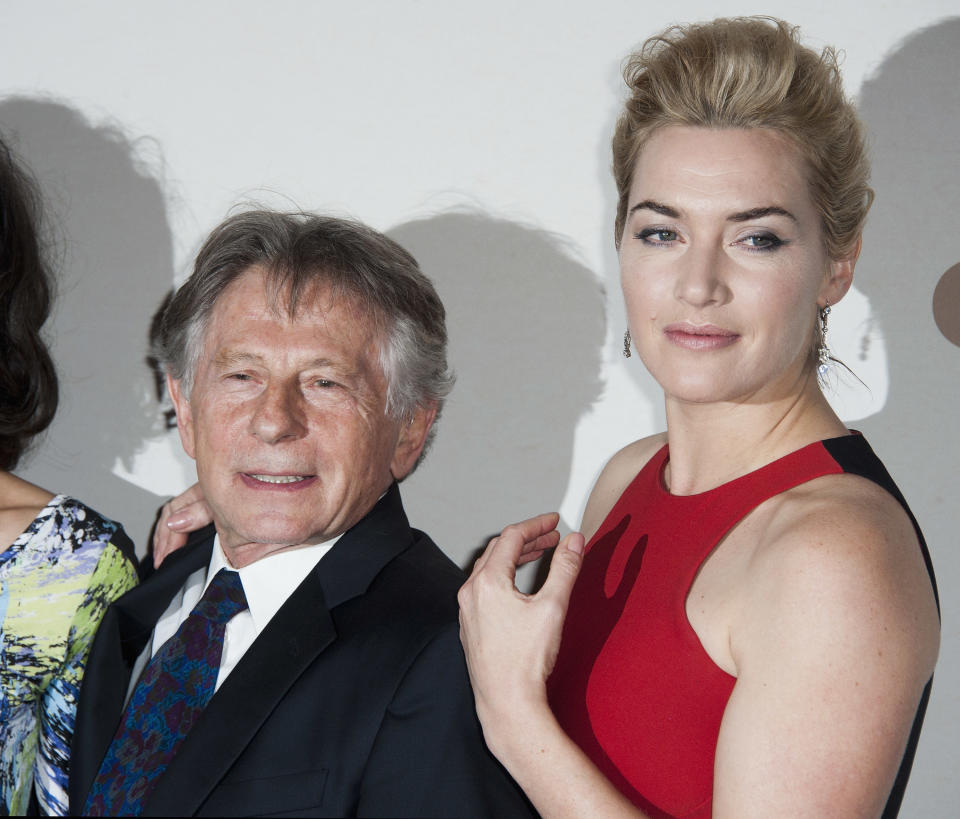 PARIS, FRANCE - NOVEMBER 20:  Kate Winslet and Roman Polanski attend the premiere of ' Carnage' at Cinema Gaumont Marignan on November 20, 2011 in Paris, France.  (Photo by Francois G. Durand/WireImage)