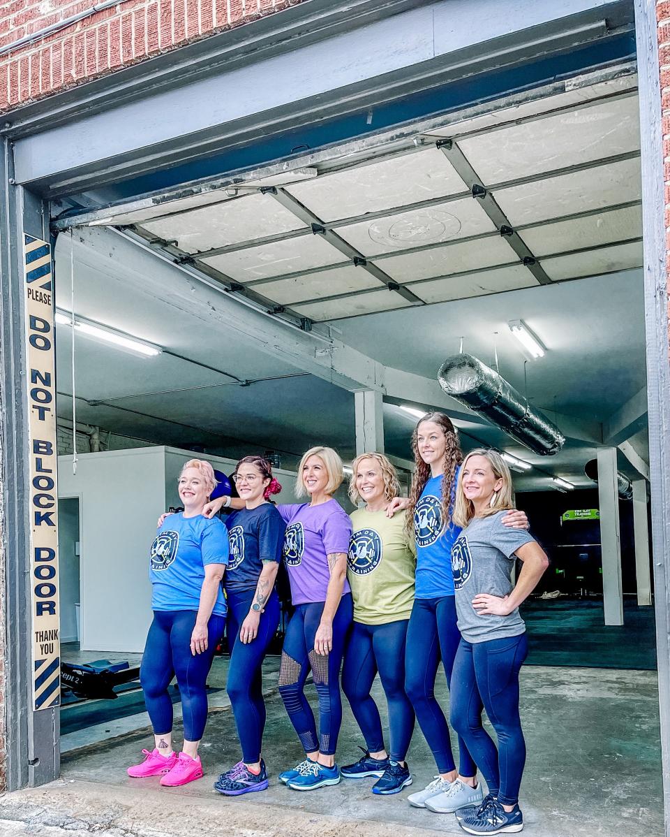 Kim Day, center, poses with her instructors for a Kim Day Training promotional photo in Fountain City on Dec. 11, 2022. From left: Samantha Hurst, Allyse Conner, Katy Hammac, Daidre Mendenhall and Misty Kirby.