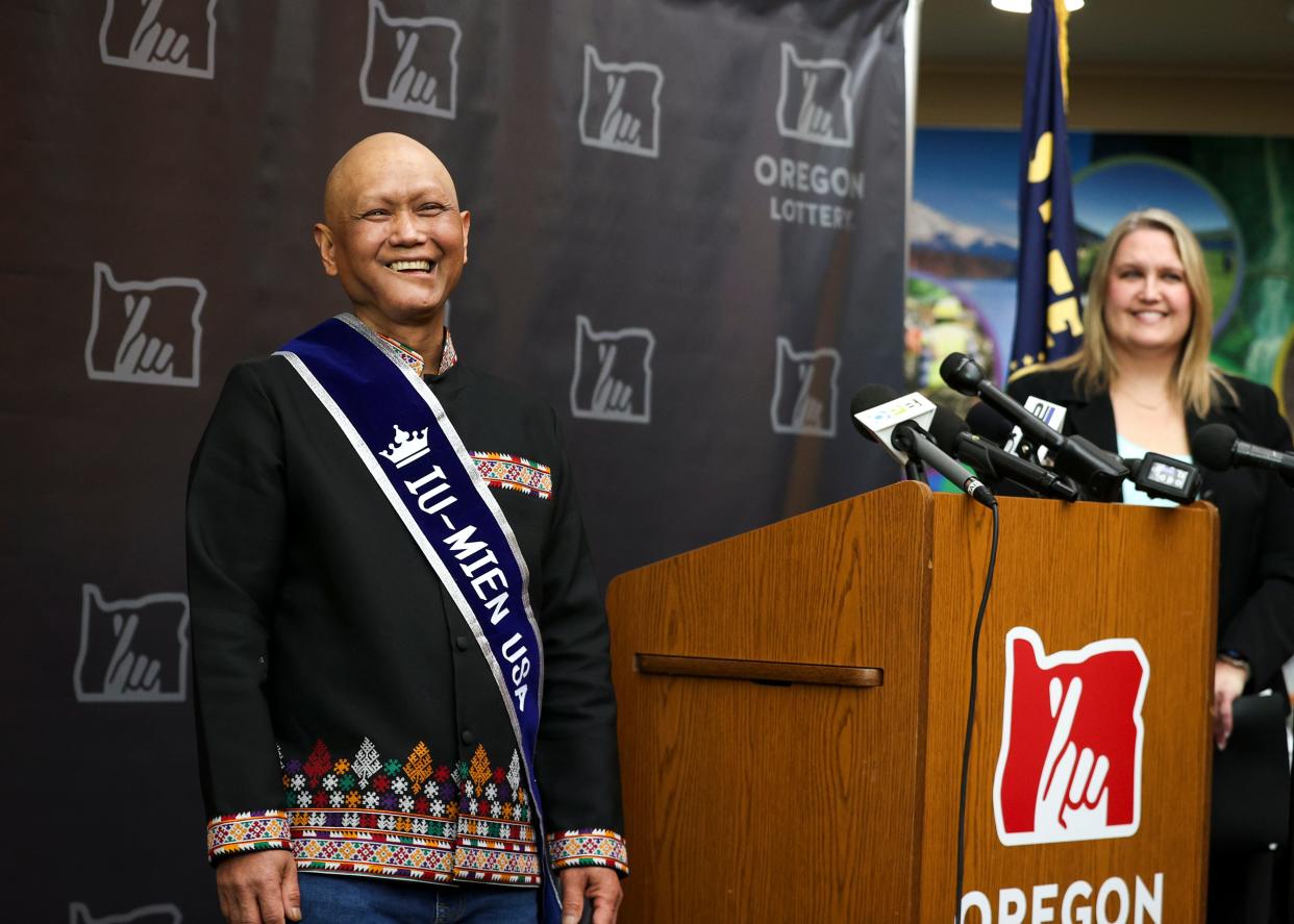 Cheng "Charlie" Saephan is announced as one of the three winners of last month's $1.3 billion Powerball on Monday, April 29, 2024 at the Oregon Lottery headquarters in Salem, Ore. His wife, Duanpen Saephan, and friend, Laiza Chao, were also winners.