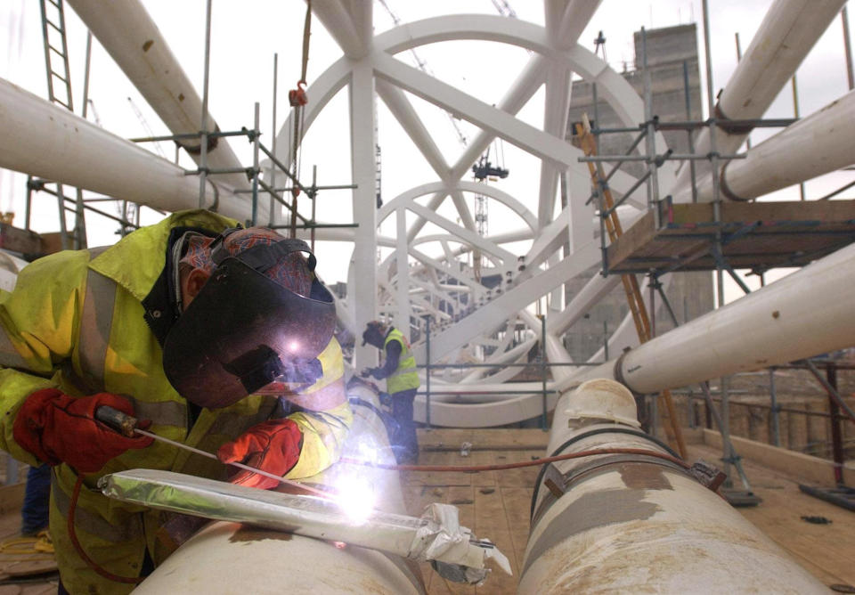 Plater Stephen Matthews welds the last piece of the arch during the construction of the new Wembley Stadium, clearing the way for the giant structure to be lifted into place within weeks. The new stadium, which is being built on the site of the old Wembley stadium in north-west London, should be completed in early 2006 and will seat 90,000 spectators.   04/03/04: Vacancies in construction and metal trades are becoming increasingly difficult to fill, highlighting a shortage of skilled workers, a new report showed. Firms are reporting a low number of applicants with the necessary skills, experience or qualifications, research found. 