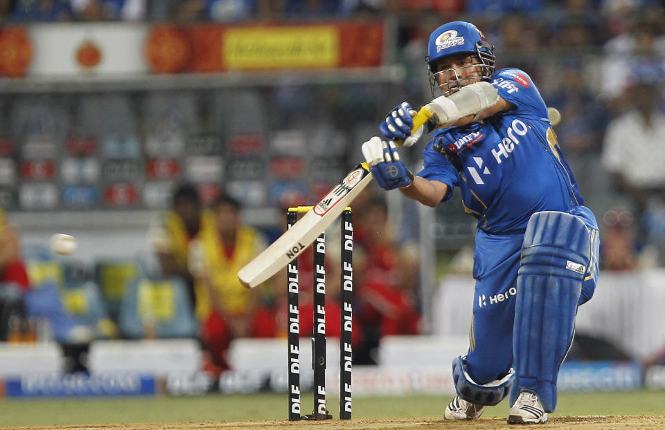 MUMBAI, INDIA - MAY 9: Mumbai Indians  batsman Sachin Tendulkar plays a shot during IPL T20 match palyed between Mumbai Indian and  Royal Challengers Bangalore at wankhede stadium on May 9, 2012 in Mumbai, India. Batting first after losing the toss Mumabi Indians posted the target of 142 runs to win.  (Photo by Vijayanand Gupta/ Hindustan Times via Getty Images)