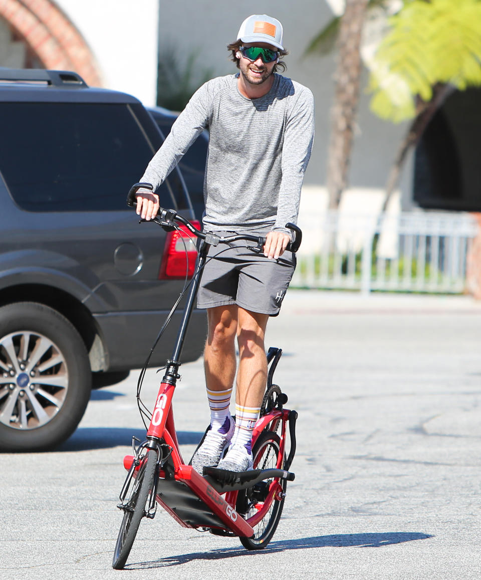 <p>Patrick Schwarzenegger takes his elliptical bike for a spin on Thursday in Los Angeles.</p>