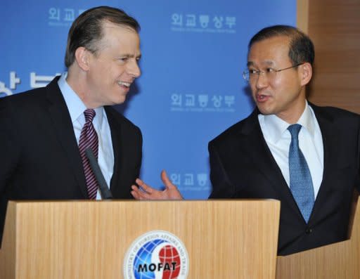 This file photo shows Glyn Davies (L), coordinator for US policy on North Korea, listening to South Korea's nuclear envoy Lim Sung-Nam during a press conference in Seoul, on February. Davies, Lim and Japan's counterpart Shinsuke Sugiyama have begun fresh talks on N.Korea and other issues amid concerns the communist state may be planning another nuclear test, according to Seoul's foreign ministry