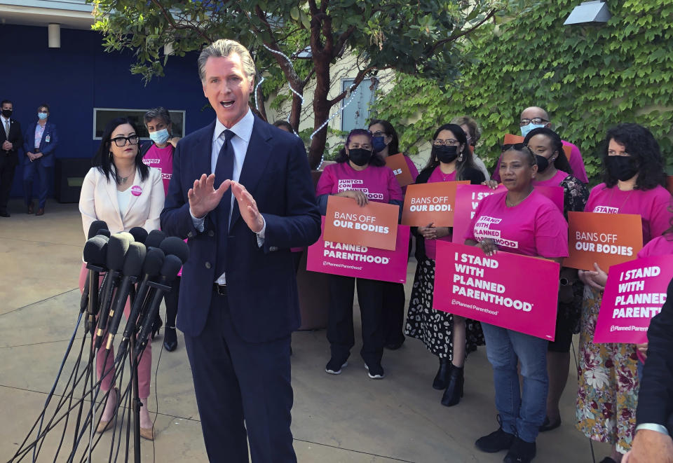 California Gov. Gavin Newsom talks at a news conference with workers and volunteers on Wednesday, May 4, 2022, at a Planned Parenthood office near downtown Los Angeles. Newsom faulted his own political party Wednesday for setbacks in the nation's culture wars and urged Democrats to launch a vocal “counter-offensive” to protect rights from abortion to same-sex marriage. (AP Photo/Michael R. Blood)