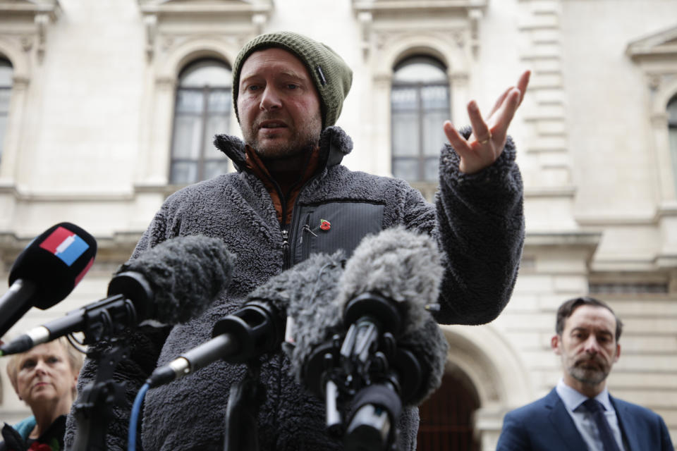 Richard Ratcliffe, husband of detained charity worker Nazanin Zaghari-Ratcliffe, talks to the media following a meeting at the Foreign, Commonwealth and Development Office in London, Thursday, Nov. 11, 2021. Ratcliffe began a hunger strike 19 days ago after a court decided his wife has to spend another year in an Iranian prison, where she has been detained since 2016. (AP Photo/David Cliff)