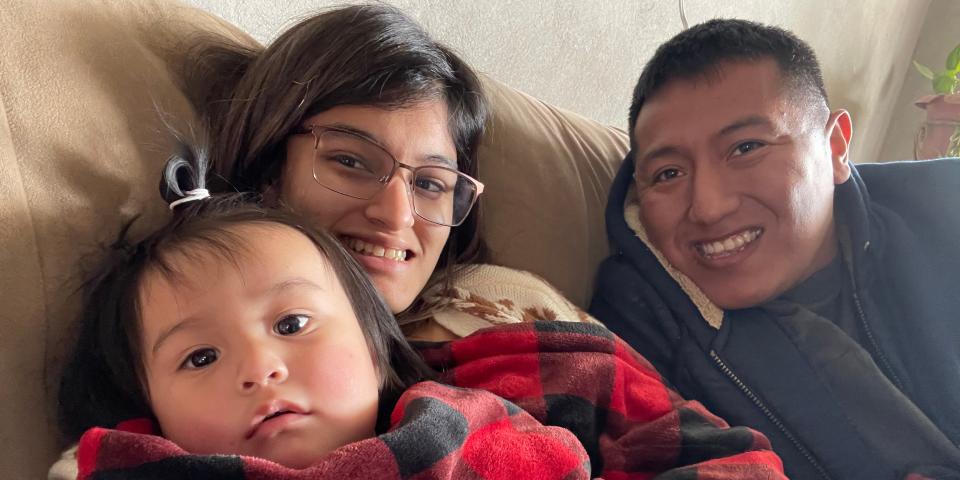 Yarianna Martinez, Jaime Avalos, and their son Noah pose for a photo.