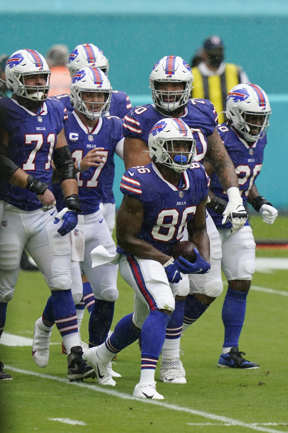 Buffalo Bills tight end Reggie Gilliam (86) celebrates with his teammates after scoring a touchdown, during the first half of an NFL football game against the Miami Dolphins, Sunday, Sept. 20, 2020, in Miami Gardens, Fla. (AP Photo/Lynne Sladky)