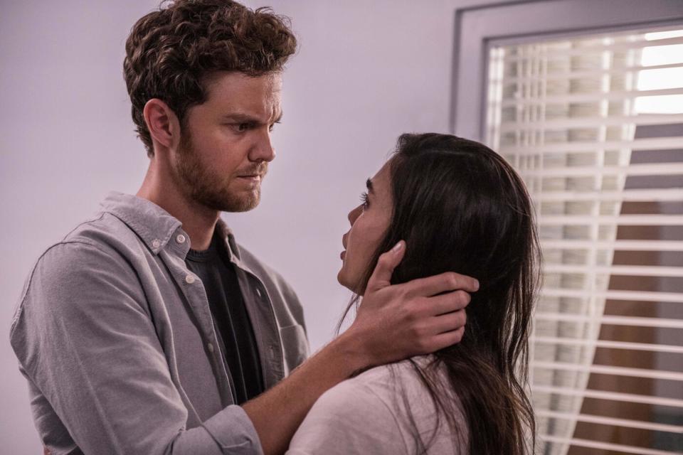 Jack Quaid embraces Melissa Barrera in a hospital