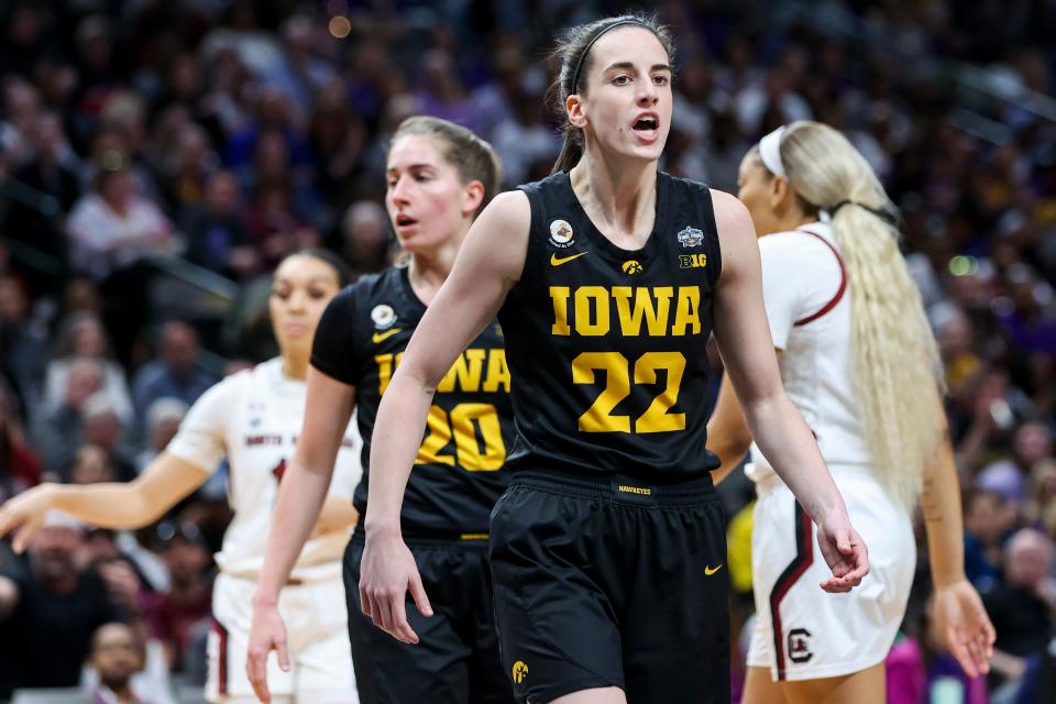 Iowa's Caitlin Clark (22) reacts against South Carolina in the semifinals of the 2023 Women's Final Four.