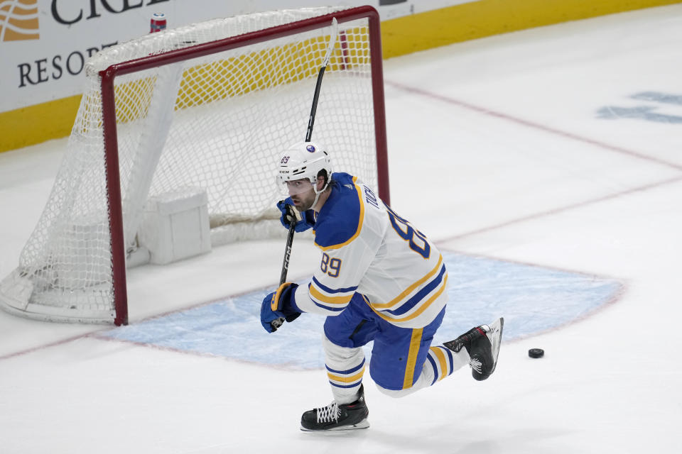 Buffalo Sabres right wing Alex Tuch (89) reacts after scoring an empty net goal against the San Jose Sharks during the third period of an NHL hockey game in San Jose, Calif., Saturday, Feb. 18, 2023. (AP Photo/Jeff Chiu)