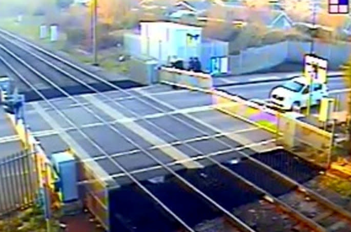 Network Rail warned people not to interfere with level crossings as it released the footage. (SWNS)